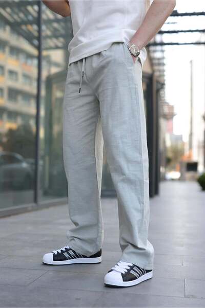 Madmext Ανδρικό παντελόνι σε πράσινο χρώμα με λεπτομέρεια στα πόδια και άνετη...