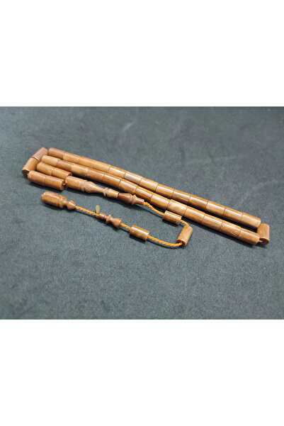 İskeçe Tesbih Τεχνούργημα του δύτη-μάστορα: Ένα κομμάτι σαν βέλος, φυσικό κομ...