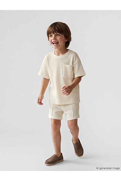 LC Waikiki تي شيرت وشورت للأولاد من LCW Kids باللون البيج مع جيوب