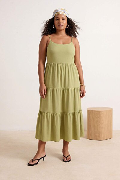 Trendyol Curve Πράσινη φούστα λαδί Ανοίγει από τη μέση Με βαμβακερό μείγμα Mi...