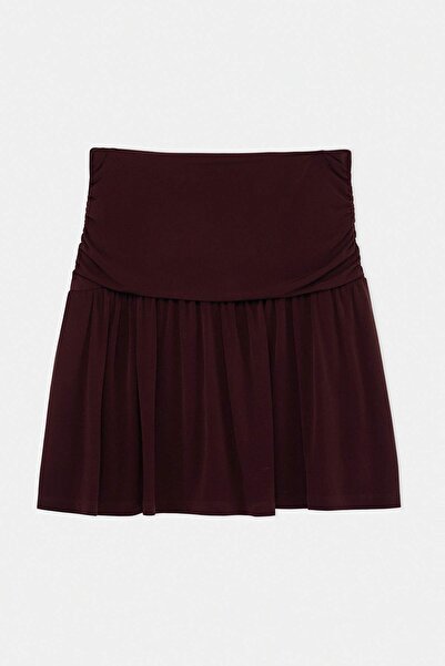 Trendyol Curve Καφέ Φούστα Μίνι Μεγάλου Μεγέθους με Σορτς Εσωτερικά TBBSS26AZ...