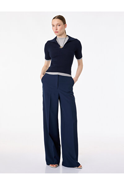 Koton Ίσιο υφασμάτινο παντελόνι με φαρδύ πόδι με τσέπες και λεπτομέρεια ρίγες...