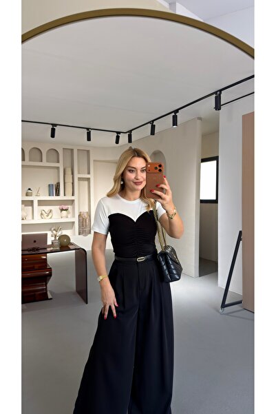 Sezgi Tekin Μαύρη μπλούζα με λεπτομέρεια ντραπέ και χρωματικά μπλοκ