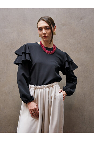 KÜÇÜĞÜM BUTİK Μαύρη μπλούζα κρεπ με βολάν