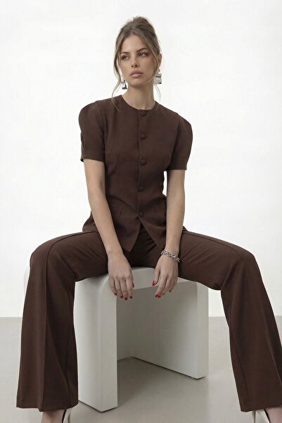 VAGGON Set jachetă cu buzunare duble și nasturi și pantaloni evazați