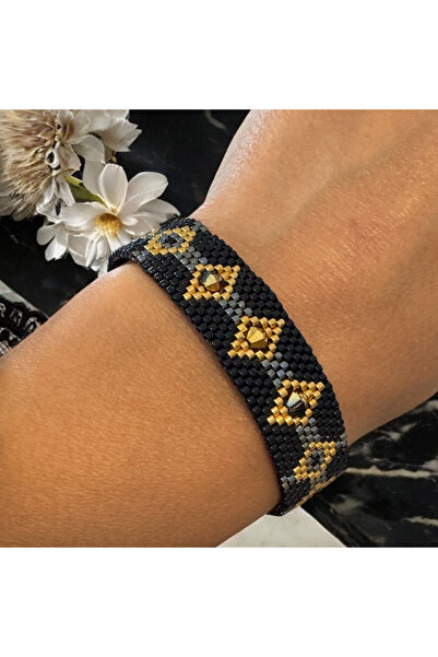 Ezera Κομψό, φαρδύ βραχιόλι Λεόνα, ραμμένο στο χέρι σε μαυροχρυσαφί αποχρώσει...