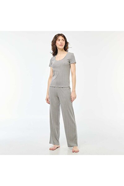 KIABI بنطلون بيجامة محبوك مضلع باللون الأزرق