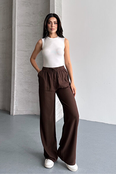 macharel jeans Γυναικείο παντελόνι παλάτσο με φαρδιά μπατζάκια και τσέπες