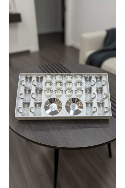 Generic A luxurious hospitality set – coffee cups and tea glasses with elegan...