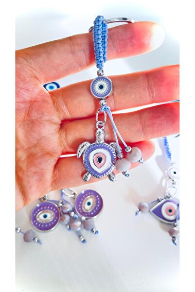 Cassime Ασημένιο μπρελόκ με σχέδιο μάτι της τύχης σε λιλά χρώμα