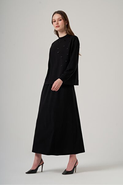 Nuss 1078 طقم تنورة مزين بالترتر من OMZU باللون الأسود