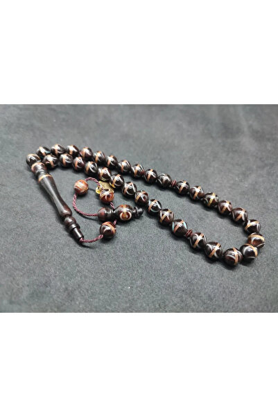 İskeçe Tesbih Τεχνούργημα του δασκάλου Χαλίλ Χιλμί: Χάλκινο σπειροειδές κουκά...