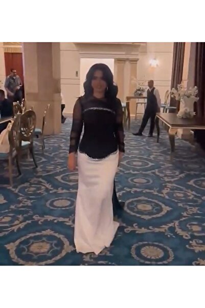 NALA FASHION فستان سهرة أنيق بتصميم يجمع بين الرقي والكلاسيكية.