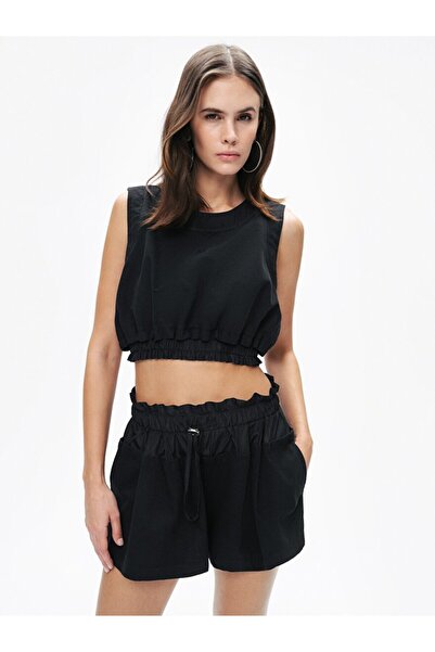 Nocturne Γυναικείο αμάνικο crop top με κορδόνι στη μέση, υφαντό ύφασμα, μαύρο...