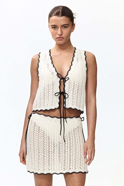 H&M تنورة شاطئية بتصميم الكروشيه