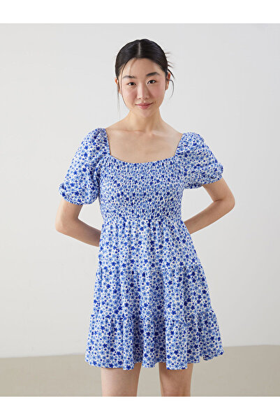 LC Waikiki Nevavm with a Difference of Lcwaikiki Classic Blue Floral Gathered...