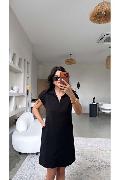 Buket Teke Βασικό φόρεμα με μαύρο γιακά και τσέπες με λεπτομέρειες μπροστά