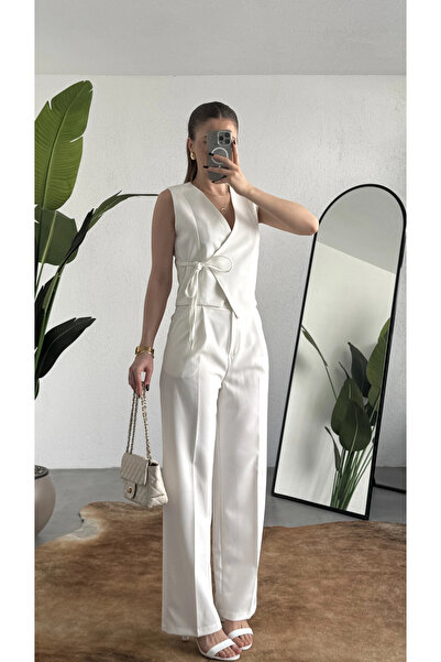 asfamoda Γυναικείο λευκό ασύμμετρο διπλό γιλέκο με δέσιμο, πλισέ παντελόνι πλ...