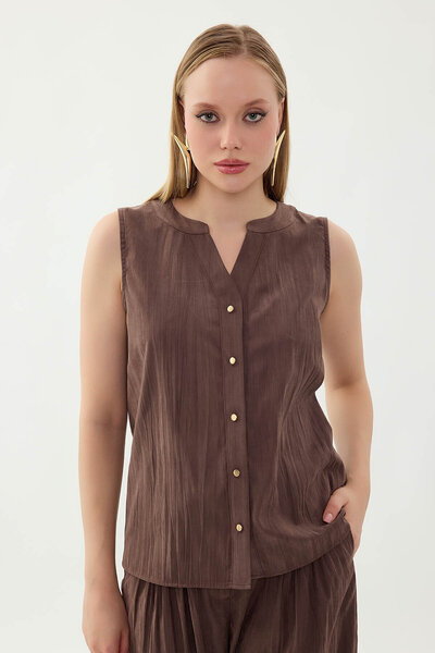 Vitrin Zero Sleeve Button Front Blouse