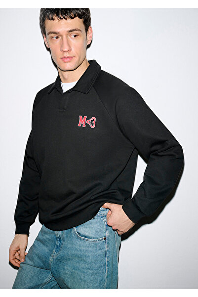 Mavi M Herzbesticktes schwarzes Sweatshirt mit Polokragen 0S10578-900
