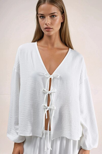Hiccup Oversized blouse with V-neck and knot closure