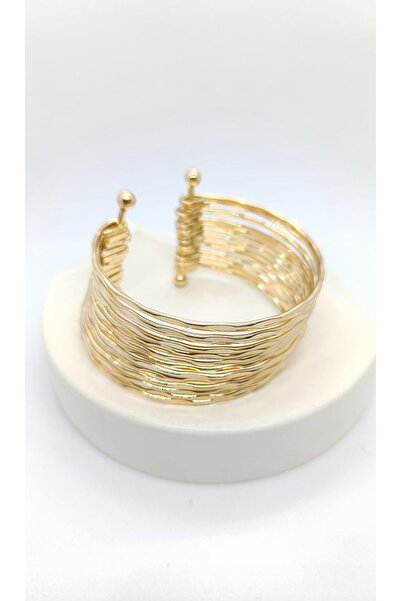 ndjewelry أمواج ذهبية - سوار موجي متألق