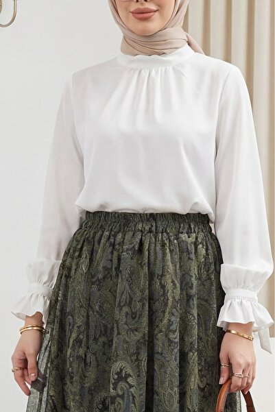 Modamorfo Блуза от вносен креп с висока яка, волани и ръкави, връзки и цип от...