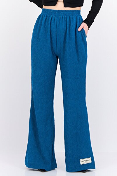 The Giving Movement Women Regular Fit Textured Flare Pants, Teal