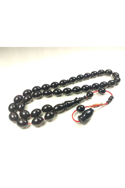 İskeçe Tesbih Τεχνούργημα του Αχμέτ Εμίν Μάστα, ξηρός κεχριμπάρι που έχει περ...