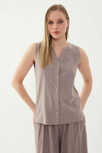 Vitrin Zero Sleeve Button Front Blouse