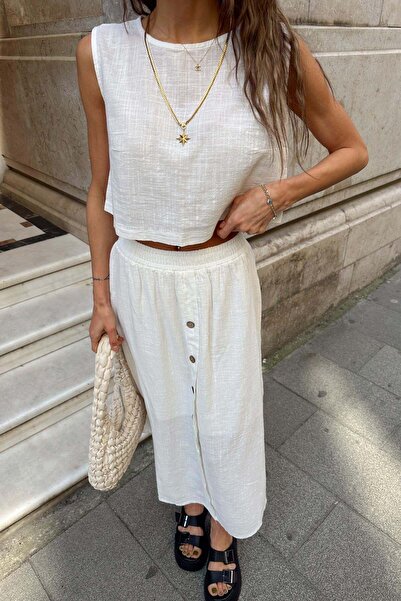 mylove بلوزة كتان بدون أكمام باللون الأبيض