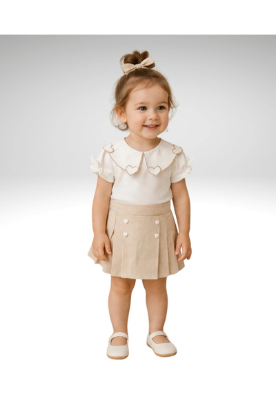 My Lusa baby wear Λεπτομερής μπλούζα με λαιμόκοψη καρδιά & πλισέ σορτς φούστα...
