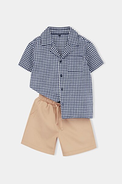 TRENDYOLKIDS Albastru marin țesătură simplă Set de top și pantaloni TKDSS26AU...