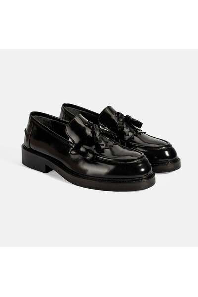 Desa حذاء لوفر جلدي مزين بشرابة سوداء للنساء