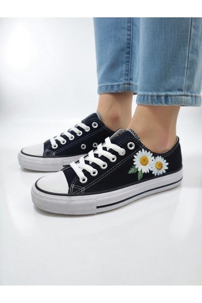 Lideral Λευκό πάνινο sneaker με λεπτομέρεια λουλουδιών μαργαρίτας από την ανο...