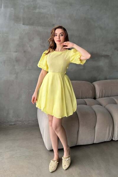 Elbee Fashion Woman Κίτρινο λινό φόρεμα με μανίκια μπαλόνι και λεπτομέρεια δε...