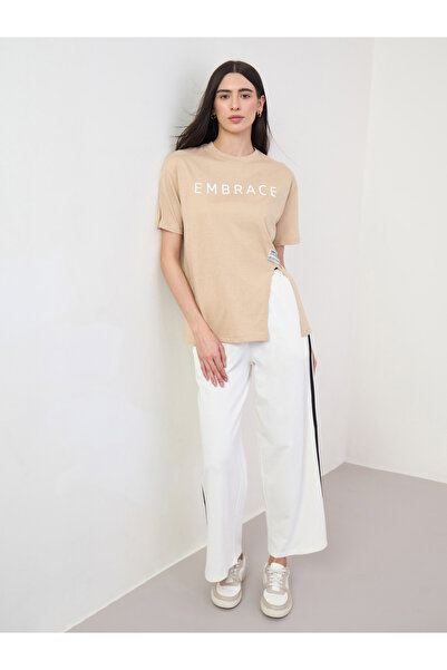 Styli Beige 100% Cotton Oversized T-Shirt with Slit and Badge Detail