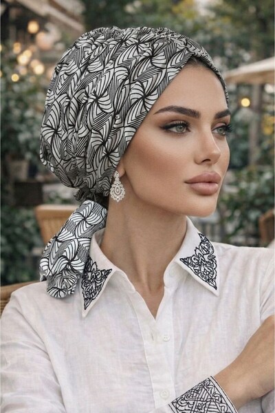Aişe tesettür Μαύρο και λευκό κοκάλινο καπέλο με σπιράλ σχέδιο και αγκράφα