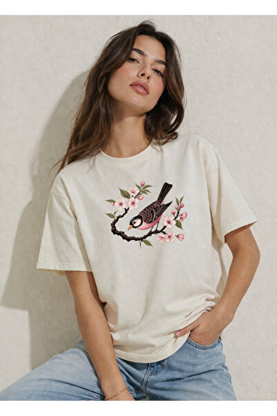 FREAK T-SHIRT Γυναικείο μπλουζάκι εκρού oversize – με μοντέρνα γραφική στάμπα...