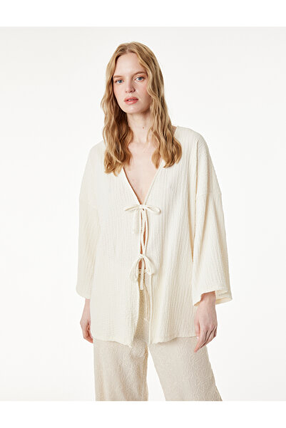 Koton Υφασμάτινο κιμονό με φαρδιά μακριά μανίκια και λεπτομέρεια δεσίματος με...