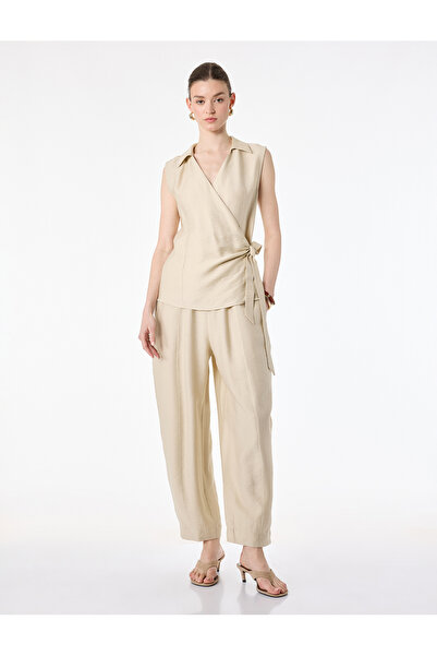 Koton Ελαστικό παντελόνι από ύφασμα βισκόζης με πλαϊνές τσέπες και λάστιχο στ...