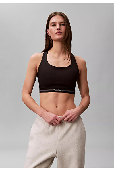 Calvin Klein Women's Slim Fit Stretch Fabric Plain Model Black Sports Bra