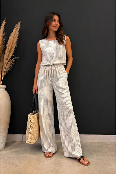 citycenterfashion Γυναικείο ριγέ παντελόνι από ύφασμα μουσελίνας με μηδενικά ...