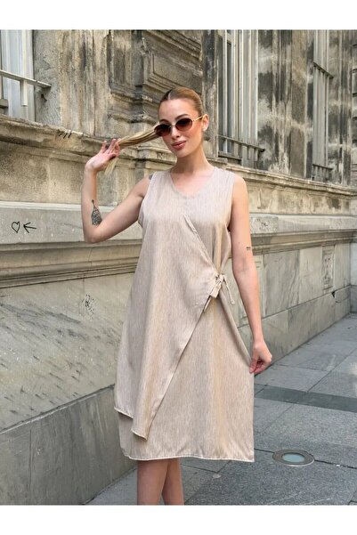 Cool & Sexy Κρεμ Φόρεμα Τένσελ με Μηδενικά Μανίκια και Πλαϊνά Δεσίματα