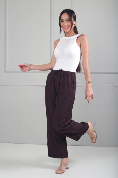 By Saygı Γυναικείο παντελόνι με ελαστική μέση, τσέπες και φαρδιά μπατζάκια σε...