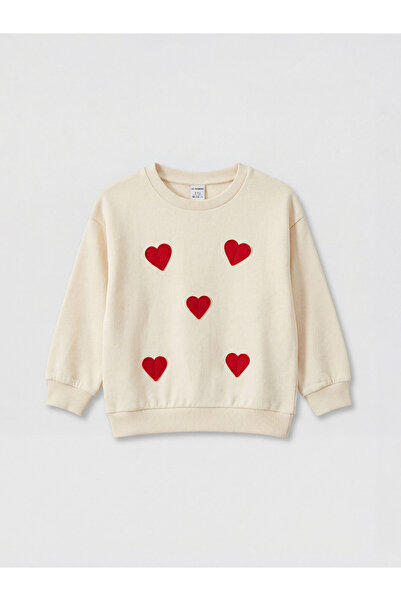 LC Waikiki Embroidered crew-neck sweatshirt for girls.