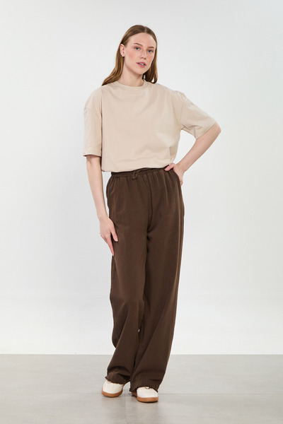 BARRELS AND OIL Γυναικείο παντελόνι με φούντες στα μπατζάκια και φαρδιά μπατζ...