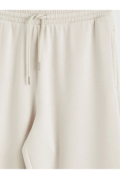 LC Waikiki Γυναικείο παντελόνι με ελαστική μέση σε μπεζ χρώμα