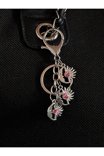 bijoux uniques Γούρι τσάντας και μπρελόκ με φιγούρα Σελήνης και Ήλιου