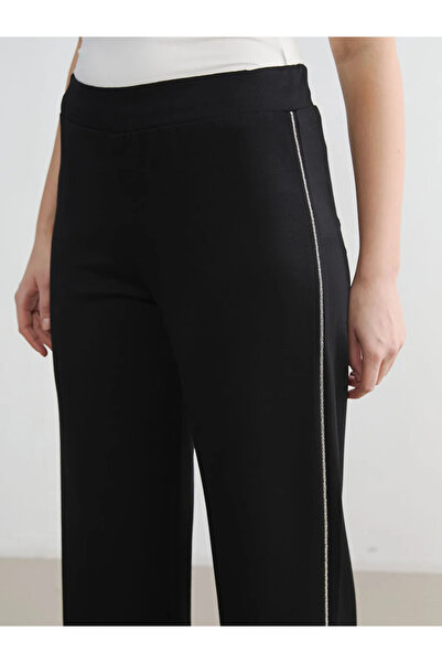 LC Waikiki Μαύρο γυναικείο παντελόνι φόρμας με ελαστική λωρίδα στη μέση και λ...